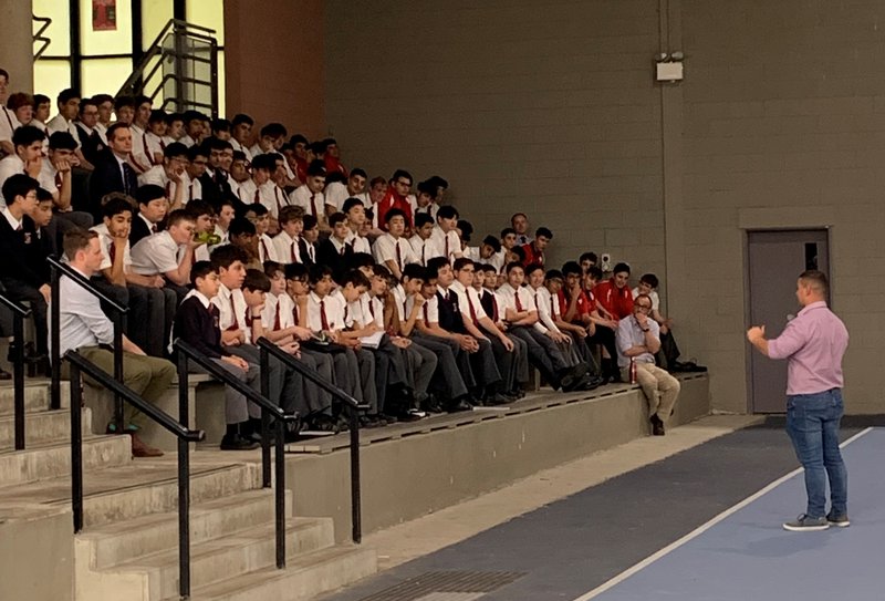Old Boy Simon Carrington speaks to the Secondary school